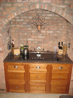Kitchen F (Detail: Arched Brick Nook with Custom Cabinetry)
