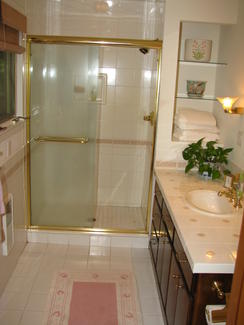 Bathroom with Oak Vanity/ Tile Counter Top