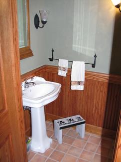 Playroom Bathroom with Stained Oak Wainscoting