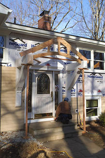 Timberframe front Entrance & Hardy Siding & Deck - Construction - View 2